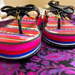 Kate Spade colorful platform flip flops.
